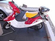 1988 Yamaha Riva Jog.  Talk about "downsizing"! lol  But it still gets the wind in my face, and i love it!!