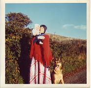 Me in my hippy phase with first baby and first dog. Happy days.