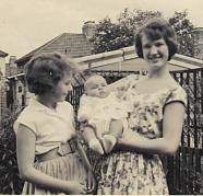 Me aged 19 holding my baby cousin Richard, his sister Cheryl is on theleft.