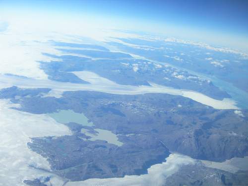 CLOUDS, SNOW AND INLETS   GREENLAND